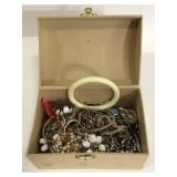 Small treasure chest full of jewelry