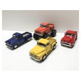 Four model vintage trucks