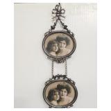 Ornate metal hanging double frame picture frame