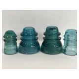 Three Hemingray & other blue glass insulators