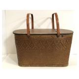 Vintage woven picnic basket w/ metal handles