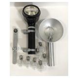 Two vintage flash attachments with bulbs