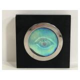 3-D eye in black square block