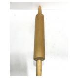 Light brown baking wooden rolling pin