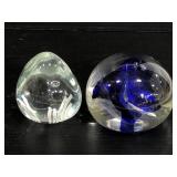 Pair of signed paperweights