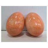 Two peach alabaster eggs