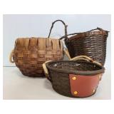 Three baskets with rope handles