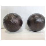Two hammered bronze ball