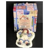 Raggedy Ann Making Snow Angel figurine