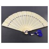 Vintage plastic cutout folding fan