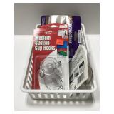 Box of suction cup hooks and felt pads