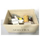 Box of assorted household supplies and hardware