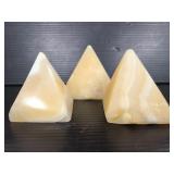 Three marble pyramids