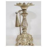 Metal ornate candlestick with snuffer attached
