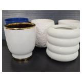 Five ceramic planters