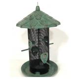 Green metal bird feeder