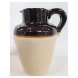 Pottery jug with lip