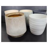 Five ceramic plant pots