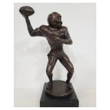 Resin football player statue