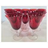 Fourteen red glass goblets