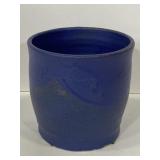 Heavy purple painted concrete pottery planter