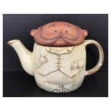 Old man pottery tea pot
