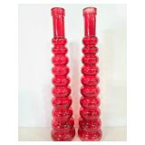 Two tall red skinny vases