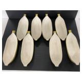 Eight ceramic banana split dishes