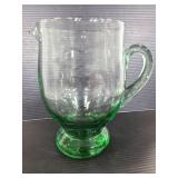 Tinted green glass pitcher