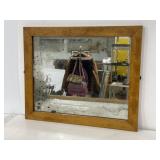 Antique wood framed vanity mirror