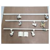 Three pieces of track lighting