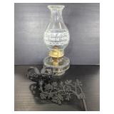 Antique oil lamp w/ cast iron wall mount