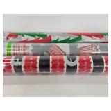 Three rolls of new wrapping paper