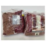 Two red curtain panels with tassles