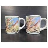 Two Applause giraffe mugs
