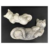 Two cement kittens on backs