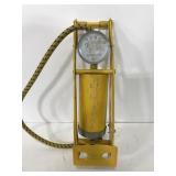 Yellow metal foot peddle tire pump