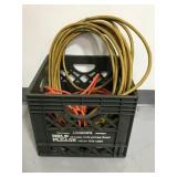 Crate of two extension cords and one work lamp