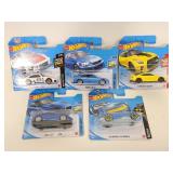 Five assorted HotWheels cars new sealed