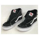 Pair of black vans skateboard tennis shoes