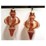 Two large illuminated outdoor Christmas ornaments