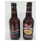 Two large glass Budweiser bottles