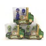 Three unopened Little Green Men play sets