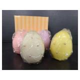Set of four egg candles