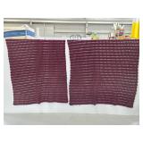 Two marroon crocheted throw blankets