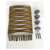 Seven MCM drawer pulls with 4 knobs