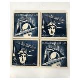 Four ceramic cork bottom New York coasters