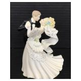 Bride and groom resin cake topper