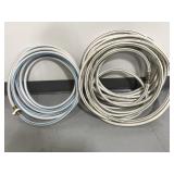 Two standard outdoor garden hoses