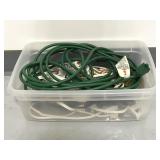 Small tote of 11 assorted extension cords